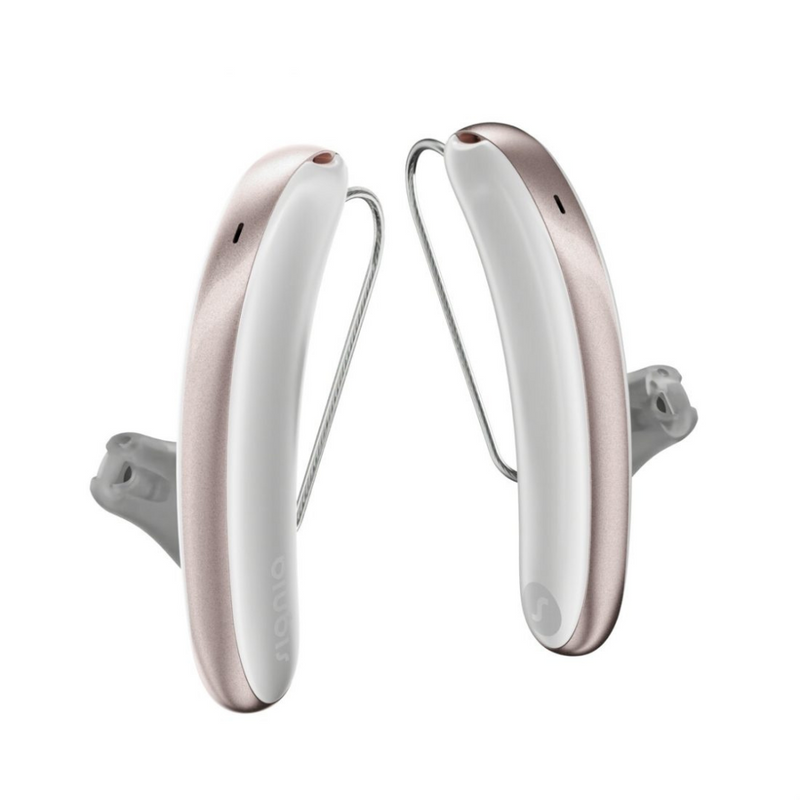 A pair of aesthetic white and rose Signia Styletto 3AX hearing aids